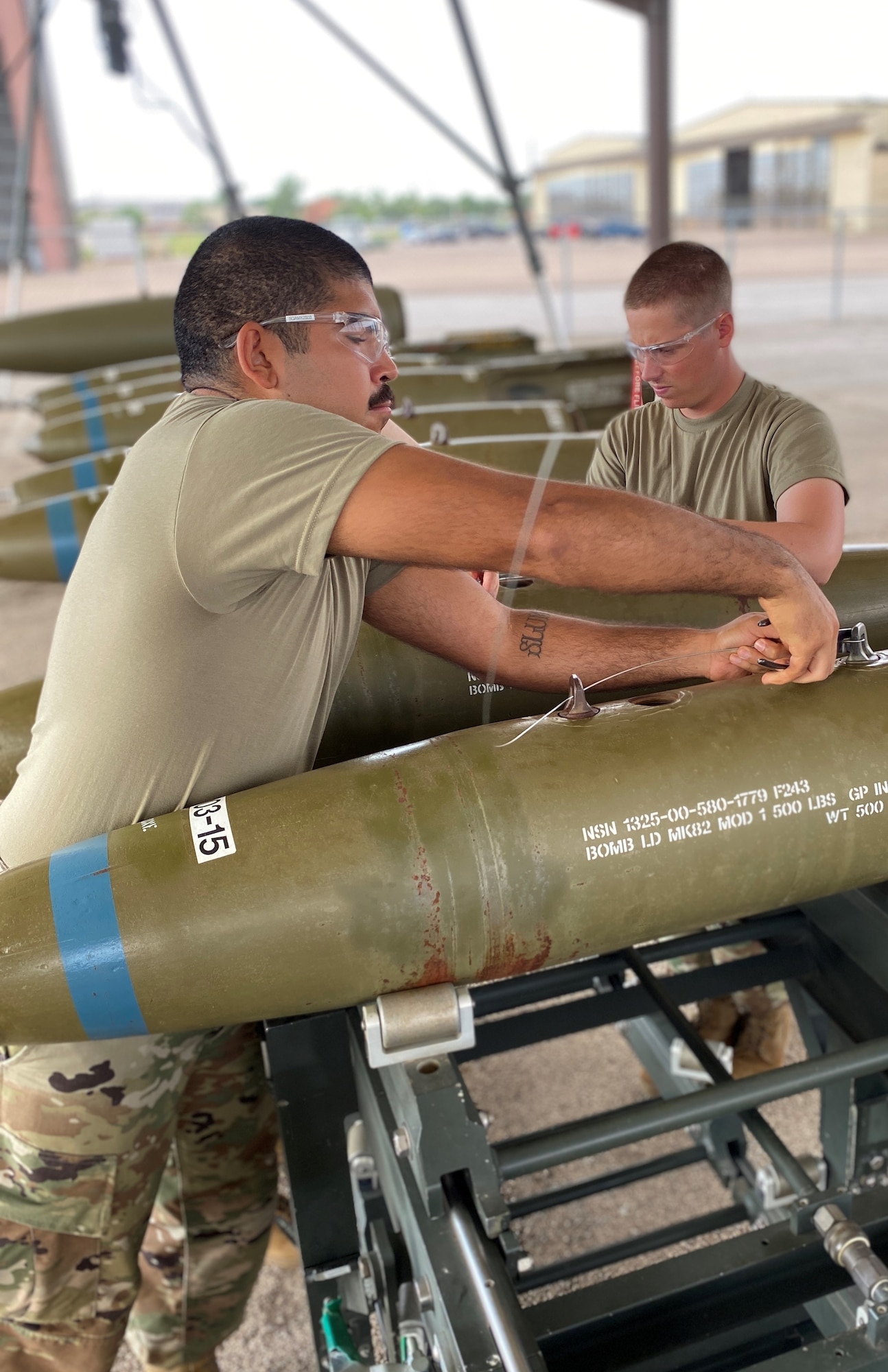 Airman 1st Class Jan Pabon, 363rd Training Squadron munitions system apprentice course student, mounts an arming wire at Sheppard Air Force Base, Texas, July 17, 2020. Pabon said he has always wanted to experience what it was like in the military. His job as a munitions systems technician gives him an experience that has a direct impact on the Air Force's mission. In his future endeavors, Pabon wishes to apply for the military Physician Assistant program. (Courtesy Photo)