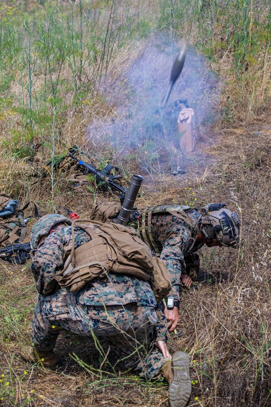 U.S. Marines with the Infantry Unit Leader Course, Advanced Infantry Training Battalion, School of Infantry - West, fire a round from an M224 60 mm mortar during live-fire training at Mortar Position 6 on Marine Corps Base Camp Pendleton, California, June 30, 2020. Marines with IULC utilized various weapons systems during the training to increase proficiency and readiness. The Marines participating in the course will leave as 0369 infantry unit leaders. (U.S. Marine Corps photo by Lance Cpl. Andrew Cortez)