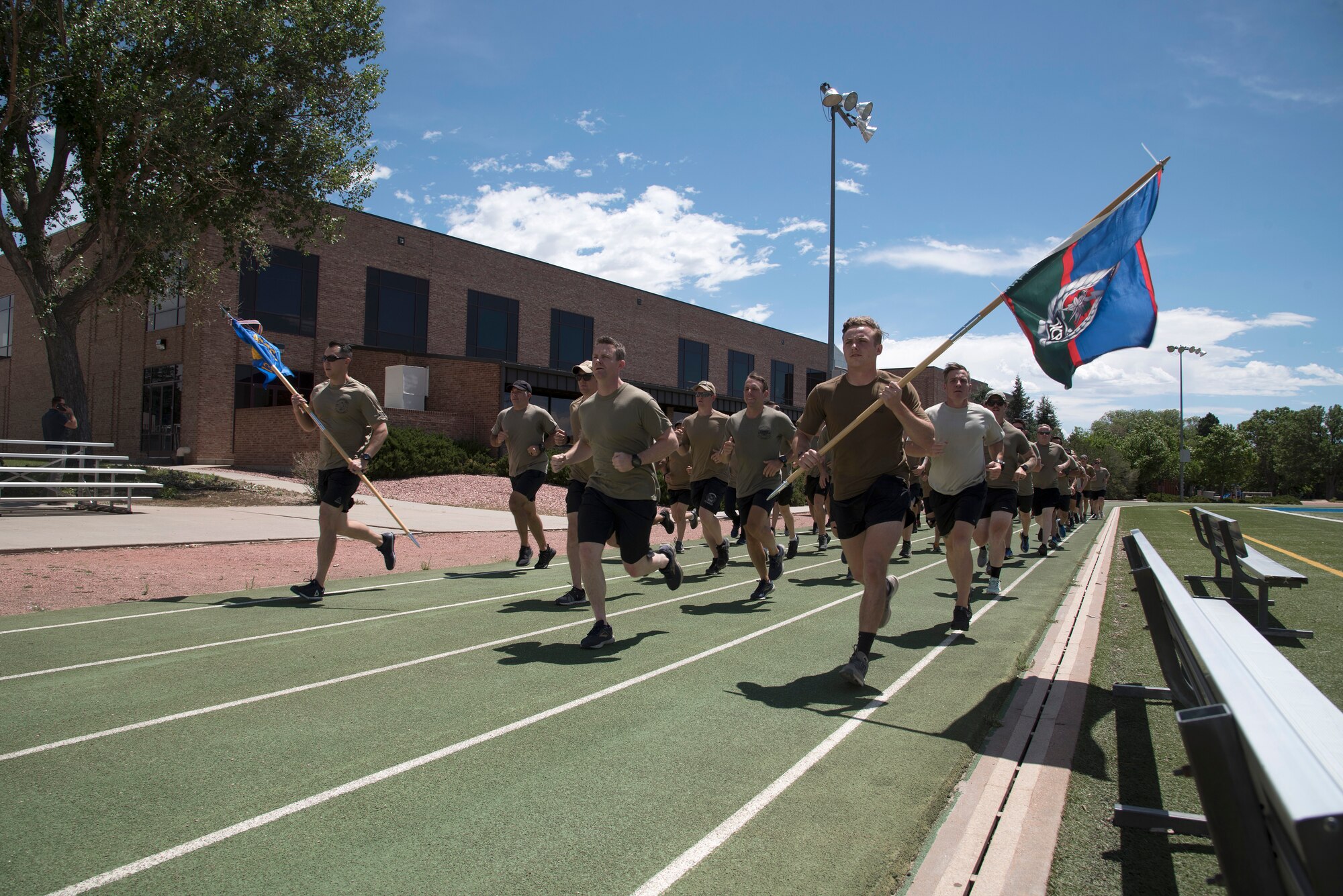 PETERSON AIR FORCE BASE, Colo. - Airmen from the 13th Air Support Operations Squadron take part in the ninth annual Tactical Air Control Party (TACP) Association 24-hour challenge run at the Peterson Air Force Base, Colorado, Fitness Center track July 13-14, 2020. The 24-hour challenge serves as a way to remember fallen service members and bring awareness and support to the TACP Association, which helps TACP service members and their families. (U.S. Air Force photo by Kristen Allen)