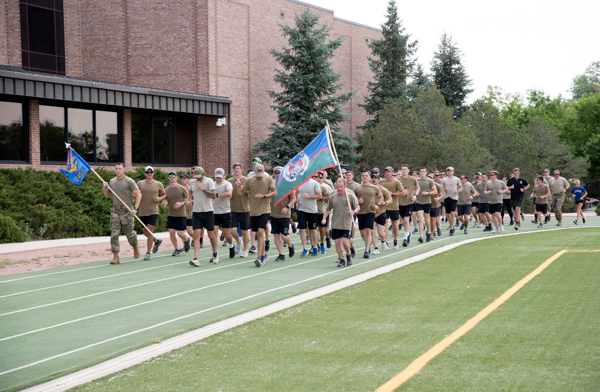 PETERSON AIR FORCE BASE, Colo. - Airmen from the 13th Air Support Operations Squadron take part in the ninth annual Tactical Air Control Party (TACP) Association 24-hour challenge run at the Peterson Air Force Base, Colorado, Fitness Center track July 13-14, 2020. The 24-hour challenge serves as a way to remember fallen service members and bring awareness and support to the TACP Association, which helps TACP service members and their families. (U.S. Air Force photo by Kristen Allen)