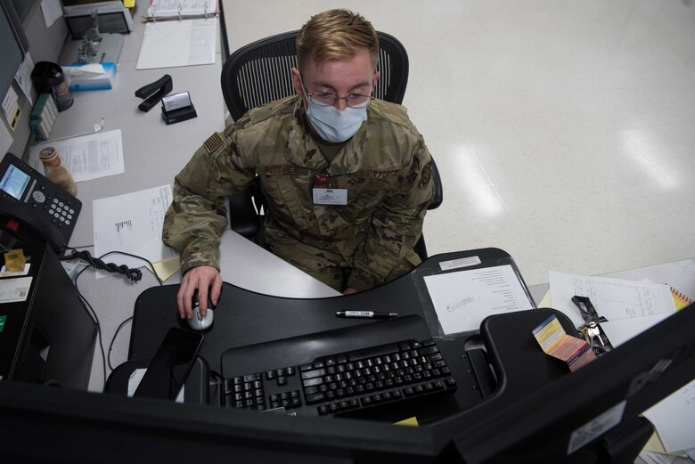 Airman 1st Class Bailey Pitcher, 22nd Medical Support Squadron acquisitions technician, orders medical supplies for the 22nd Medical Group July 15, 2020, at McConnell Air Force Base, Kansas. Pitcher ensures timely and efficient management of excess material. Medical material Airmen also ensure the medical equipment they have on hand is not expired and is ready to go upon request to the 24 units throughout the medical group. (U.S. Air Force photo by Senior Airman Alexi Bosarge)
