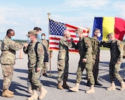 Members of the Alabama National Guard welcome a team of specialists from the Romanian Ministry of National Defense, comprised of ten medical personnel and five CBRN (chemical, biological, radiological, and nuclear) May 25, at Montgomery Aviation.