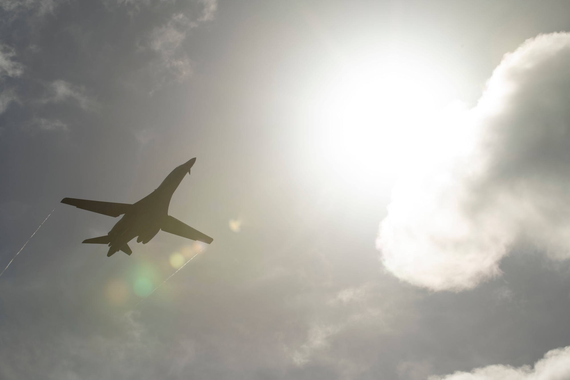 A B-1B Lancer, deployed from Ellsworth Air Force Base, S.D., as part of a Bomber Task Force, performs a flyover before landing at Andersen AFB, Guam, July 17, 2020. The BTF is deployed to Andersen AFB in support of Pacific Air Forces’ training efforts with allies, partners and joint forces. (U.S. Air Force Photo by Airman 1st Class Christina Bennett)