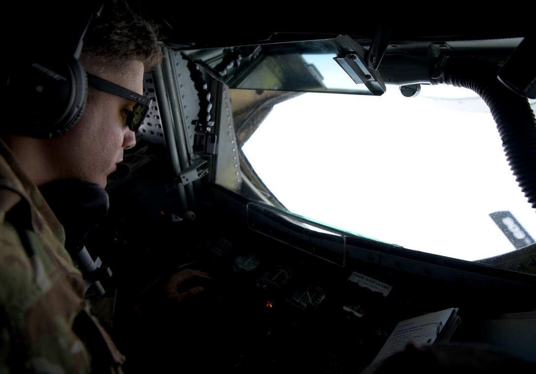 A U.S. Air Force Airman boom operator assigned to the 909th Air Refueling Squadron, Kadena Air Base, Japan, refuels a B-1B Lancer from the 28th Bomb Wing, Ellsworth Air Force Base, S.D., during a Bomber Task Force mission, July 17, 2020. Bomber Task Force missions demonstrate Pacific Air Forces’ lines of effort: sharpen lethality and improve interoperability; strengthen alliances and partnerships; and operating concepts for great power competition. (U.S. Air Force photo by Airman 1st Class Rebeckah Medeiros)