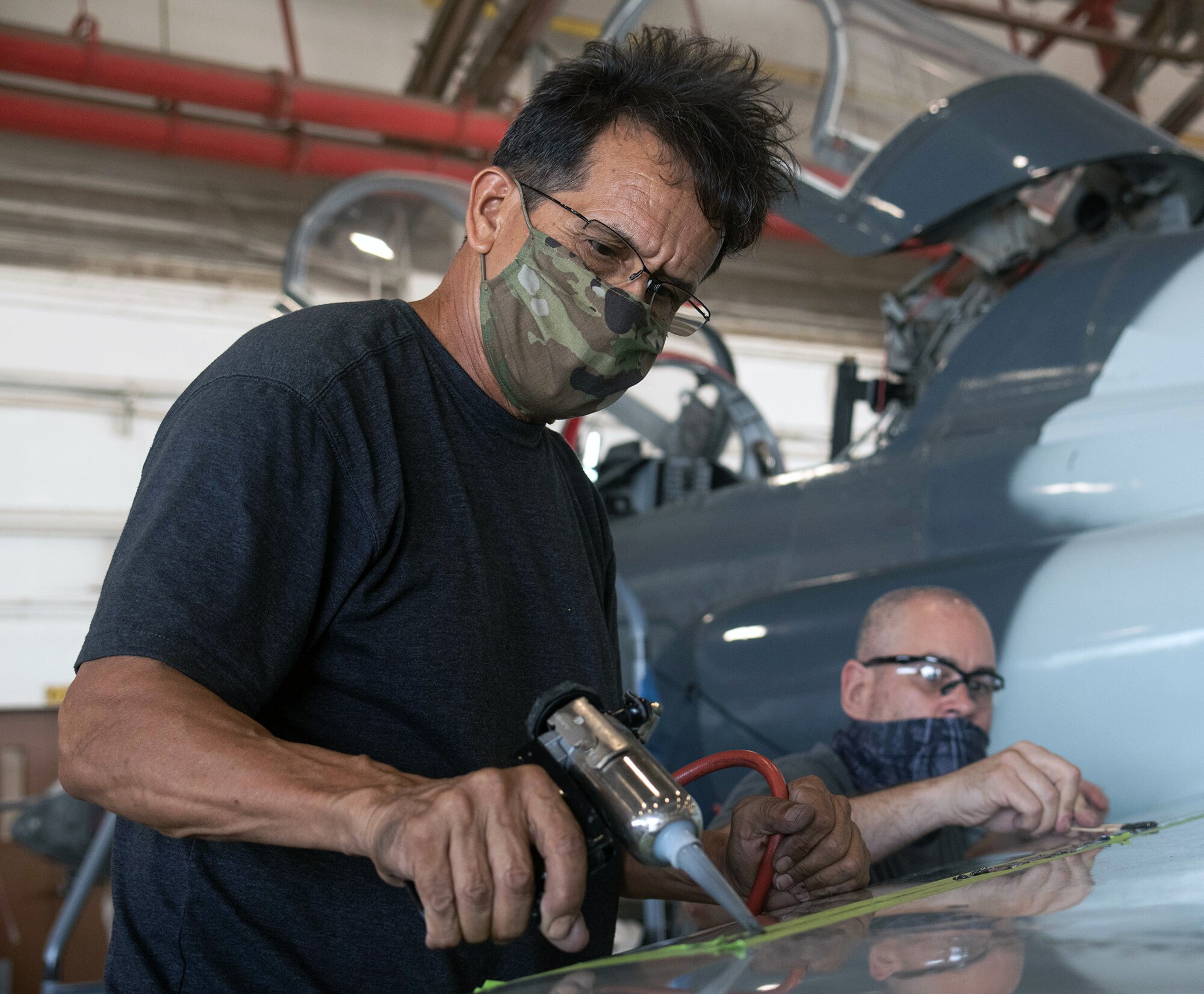 Roger Arredondo, 12th Maintenance Squadron T-6A aircraft maintenance chief, conducts a regular aircraft control check at Joint Base San Antonio-Randolph July 14.