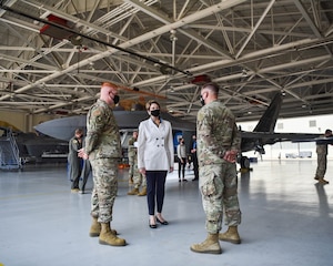 Secretary of the Air Force Barbara M. Barrett speaks with Airmen in front of a U.S. Air Force F-22 Raptor at the 94th Aircraft Maintenance Unit at Joint Base Langley-Eustis, Virginia, July 17, 2020. Barrett received briefings about how Airmen are keeping the F-22s maintained and mission ready in the midst of the Coronavirus pandemic. (U.S. Air Force photo by Senior Airman Marcus M. Bullock)