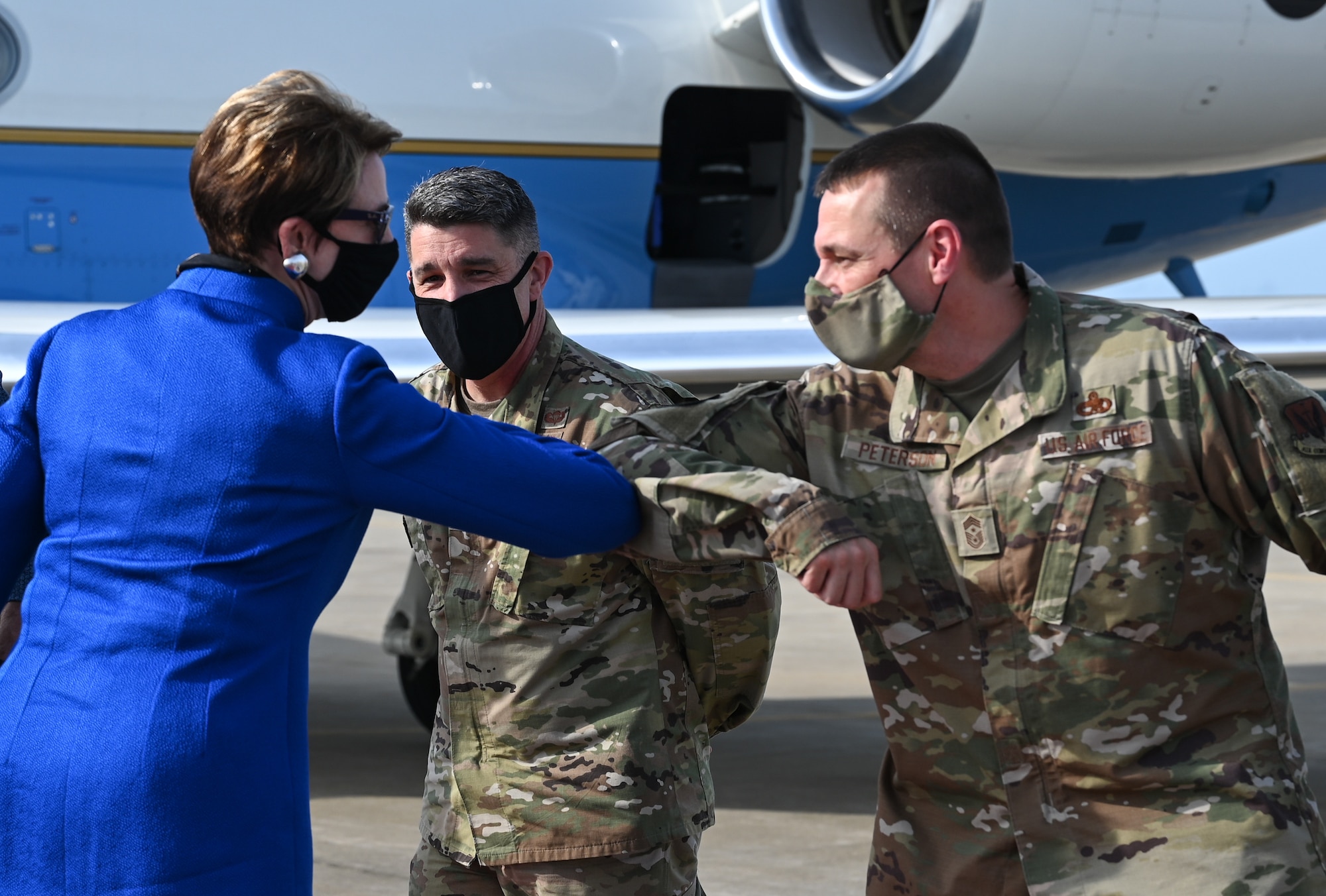 Secretary of the Air Force Barbara M. Barrett is greeted by U.S. Air Force Col. Col. Clinton Ross, 633rd Air Base Wing commander, and Chief Master Sgt. Gregory Peterson, 633 ABW command chief, at Joint Base Langley-Eustis, Virginia, July 16, 2020. Barrett toured the 1st Fighter Wing, the 363rd Intelligence, Surveillance and Reconnaissance Wing and the 480th ISRW. (U.S. Air Force photo by Airman 1st Class Sarah Dowe)