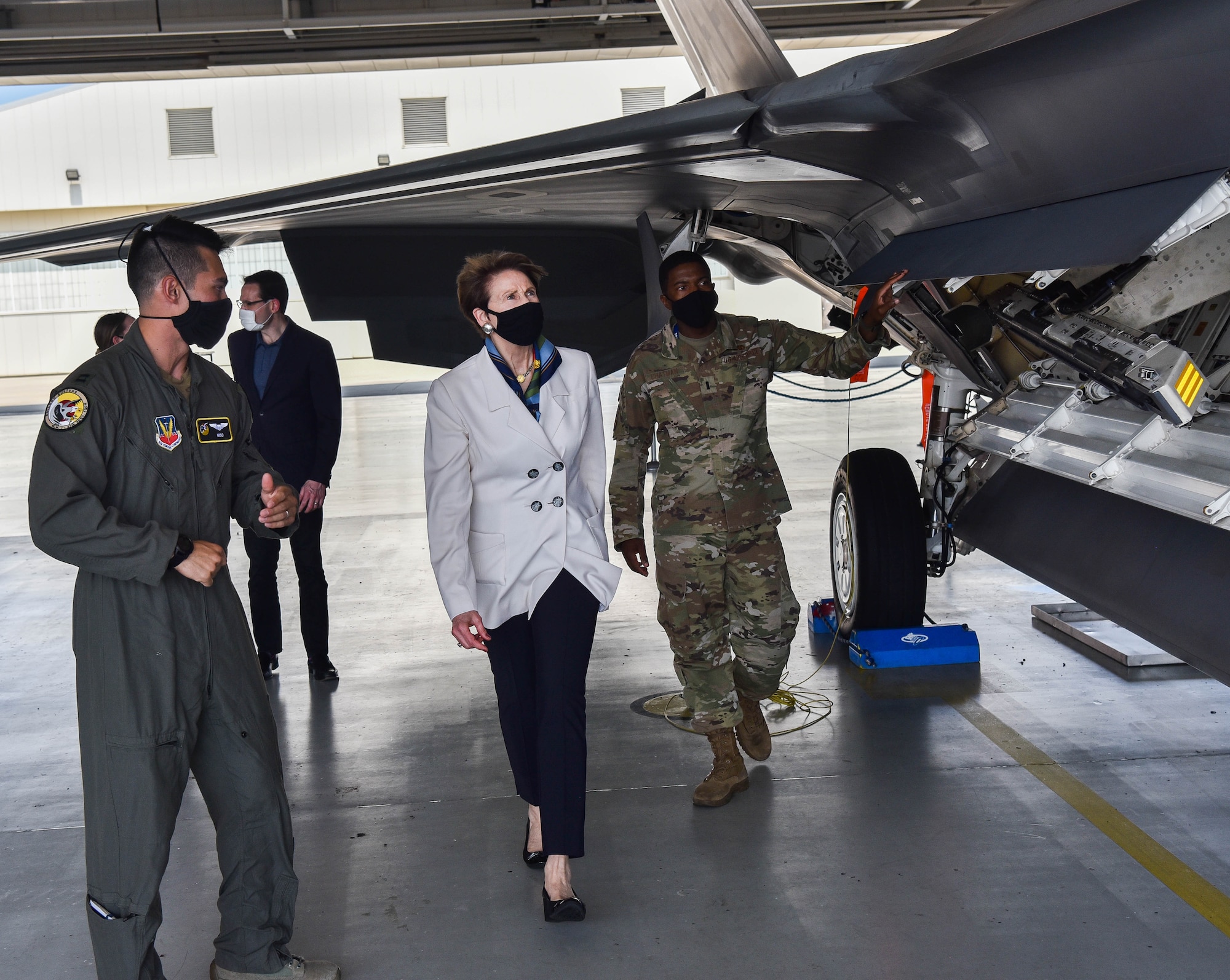 Secretary of the Air Force Barbara M. Barrett tours a static U.S. Air Force F-22 Raptor at the 94th Aircraft Maintenance Unit at Joint Base Langley-Eustis, Virginia, July 17, 2020. Barrett received briefings about how Airmen are keeping the F-22s maintained and mission ready in the midst of the Coronavirus pandemic. (U.S. Air Force photo by Senior Airman Marcus M. Bullock)