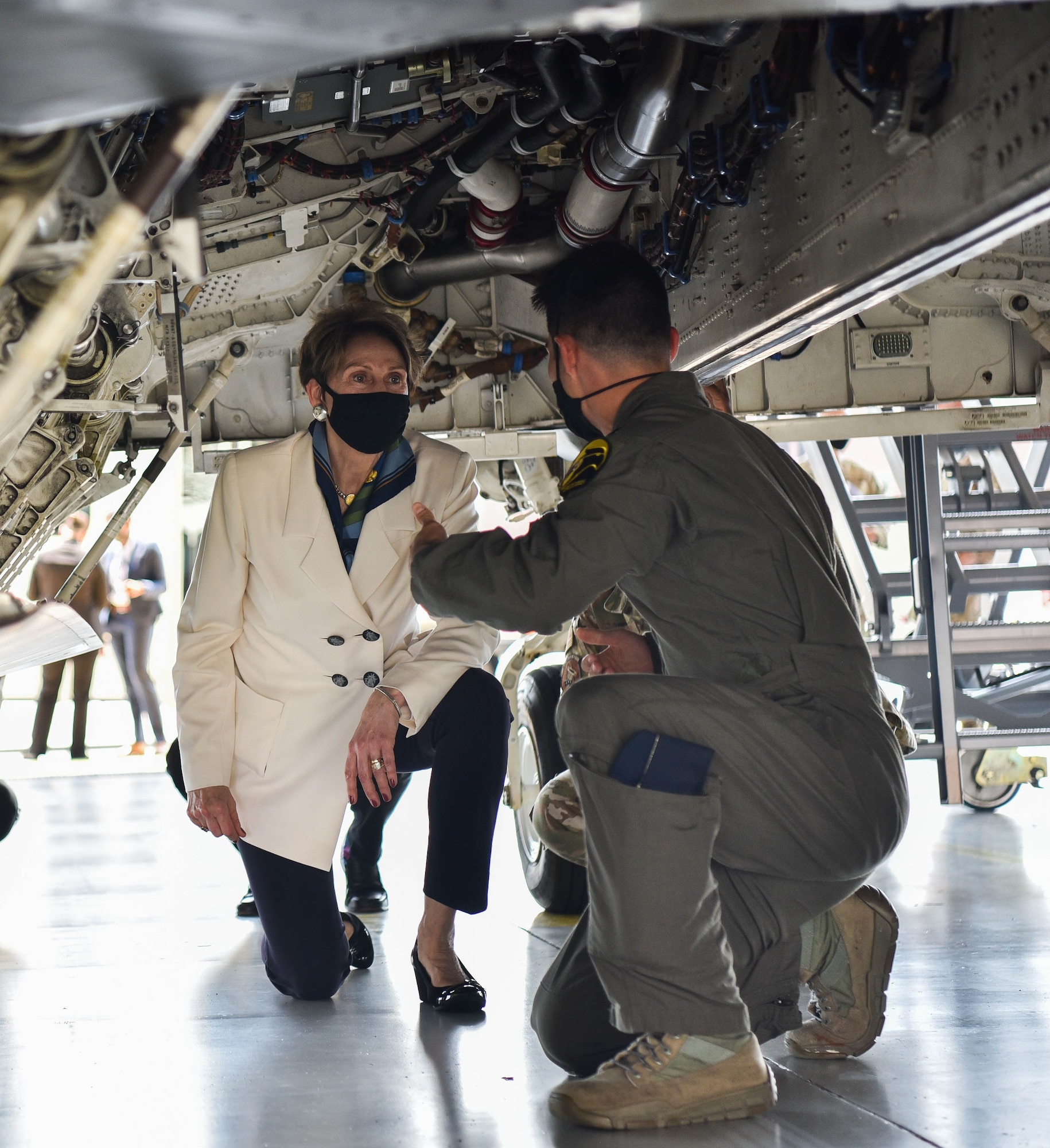 Secretary of the Air Force Barbara M. Barrett tours a static U.S. Air Force F-22 Raptor at the 94th Aircraft Maintenance Unit at Joint Base Langley-Eustis, Virginia, July 17, 2020. Barrett received briefings about how Airmen are keeping the F-22s maintained and mission ready in the midst of the Coronavirus pandemic. (U.S. Air Force photo by Senior Airman Marcus M. Bullock)