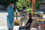 Colorado National Guard Spc. Michael Price, medic, 928th Medical Company (Area Support), instructs nurses at a nursing home in Grand Junction on COVID-19 test procedures June 3, 2020. The Colorado National Guard is increasing COVID-19 testing across Colorado as needed.