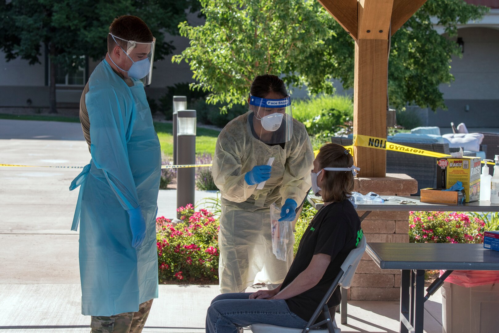 Colorado National Guard Spc. Michael Price, medic, 928th Medical Company (Area Support), instructs nurses at a nursing home in Grand Junction on COVID-19 test procedures June 3, 2020. The Colorado National Guard is increasing COVID-19 testing across Colorado as needed.
