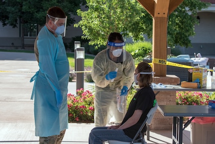 Colorado National Guard Spc. Michael Price, medic, 928th Medical Company (Area Support), instructs nurses at a nursing home in Grand Junction on COVID-19 test procedures June 3, 2020. The Colorado National Guard is increasing COVID-19 testing across Colorado as needed.