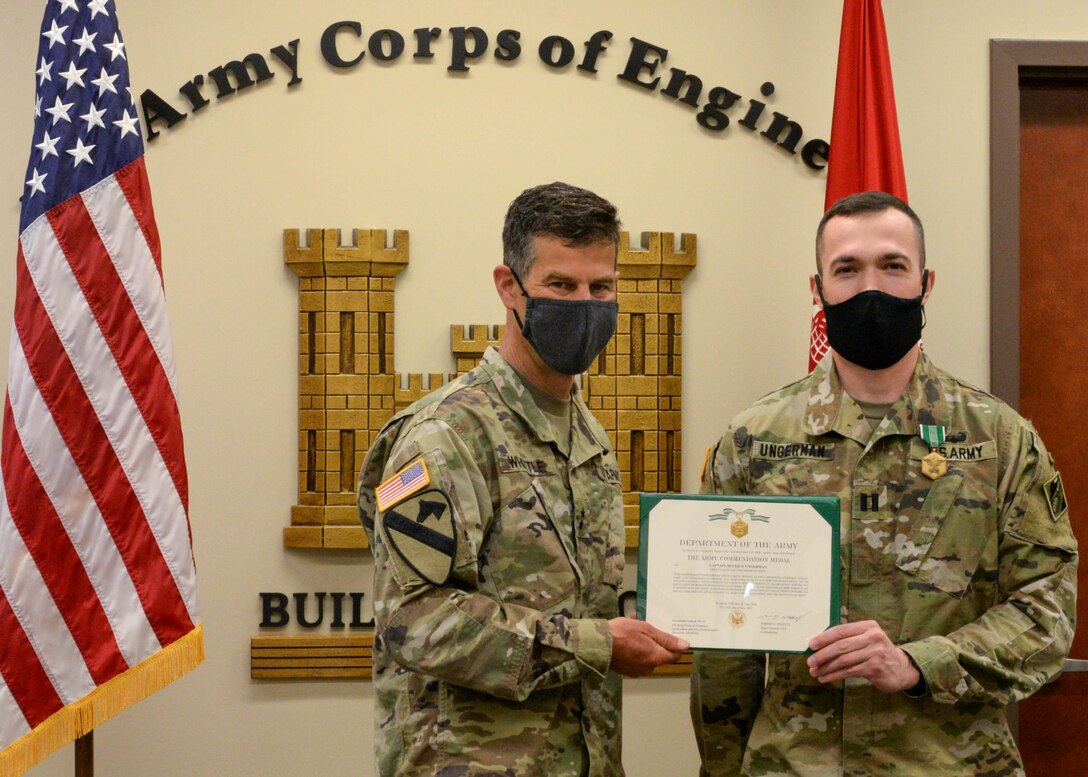 Great Lakes and Ohio River Division Commander Maj. Gen. Robert F. Whittle Jr. recently awarded Aide-De-Camp Capt. Meyer Ungerman with the Army Commendation Medal for his leadership contributing to the division's success during the COVID-19 response mission.