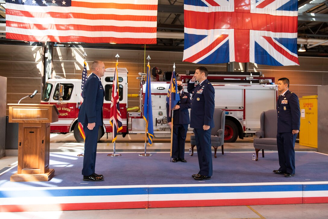 U.S. Air Force Maj. Hans Winkler, center, 423rd Civil Engineer Squadron (CES) incoming commander, assumes command of the 423rd CES from Maj. Chin T. Hsu, right, 423rd CES outgoing commander, during the 423rd CES Change of Command ceremony at RAF Alconbury, England, July 17, 2020. The change of command ceremony is rooted in military history dating back to the 18th century representing the relinquishing of power from one officer to another. (U.S. Air Force photo by Airman 1st Class Jennifer Zima)