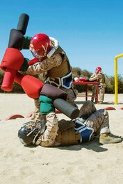 Recruits with Kilo Company, 3rd Recruit Training Battalion participate in Pugil Sticks at Marine Corps Recruit Depot, San Diego, July 15, 2020.