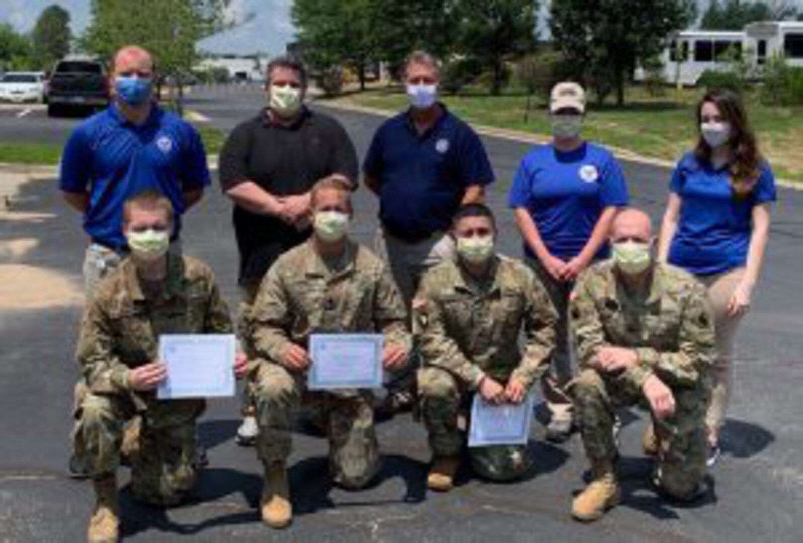 The Virginia Department of Emergency Management’s Region 7 (Northern Virginia) staff recognizes Virginia National Guard Soldiers who helped process personal protective equipment requests at their Regional Logistics Warehouse.