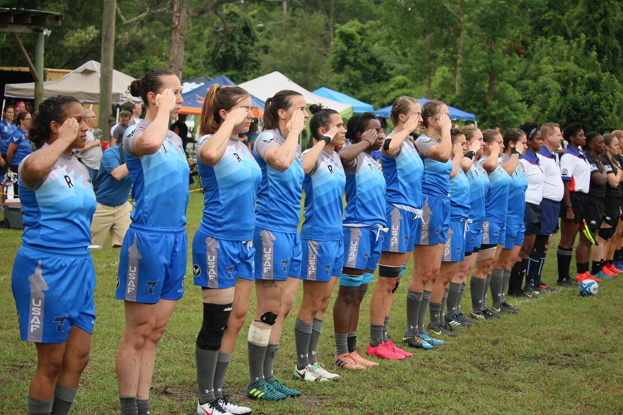 Air Force Women's Rugby Team salutes at game