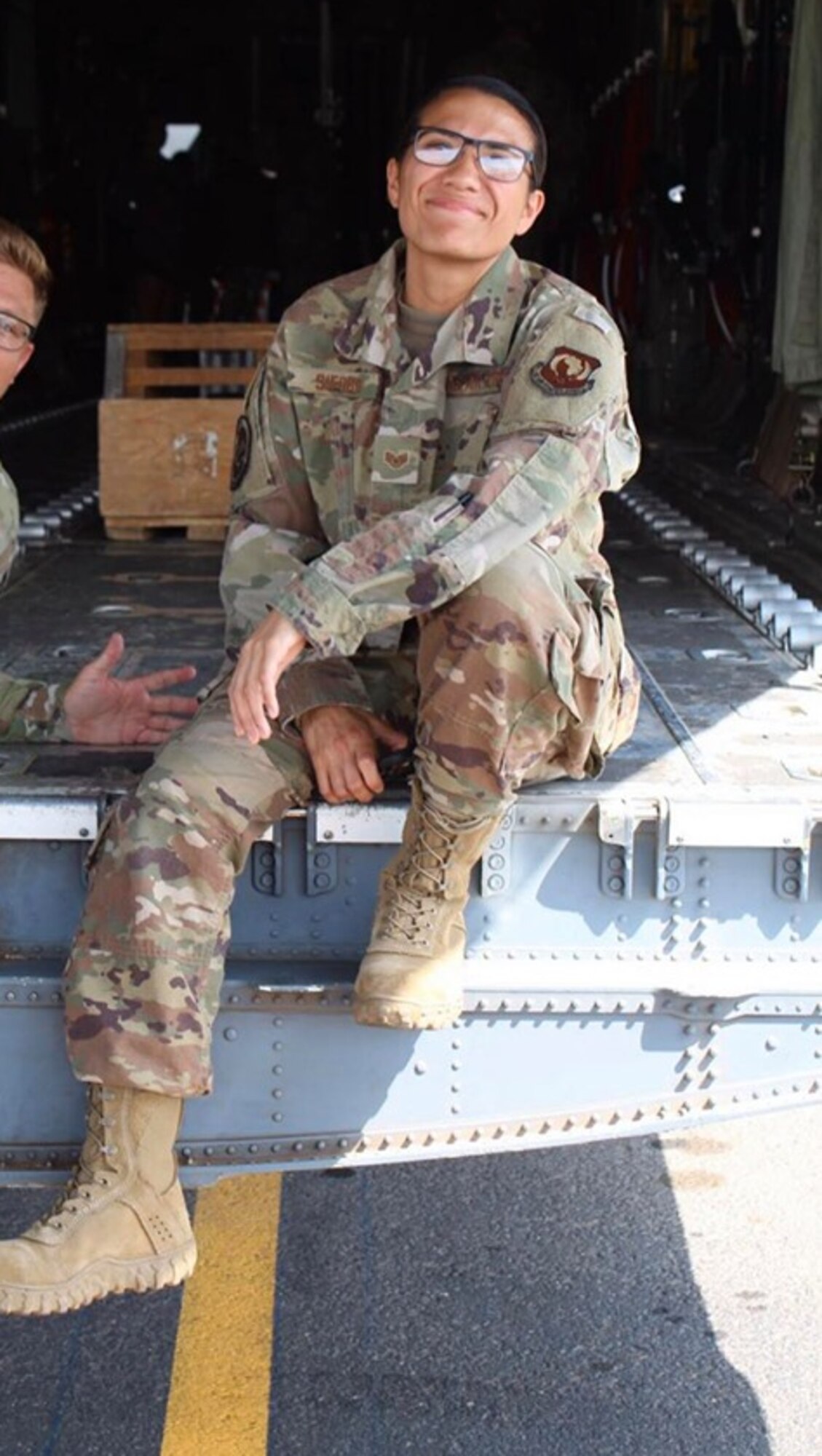 Sergeant poses on C-130J ramp