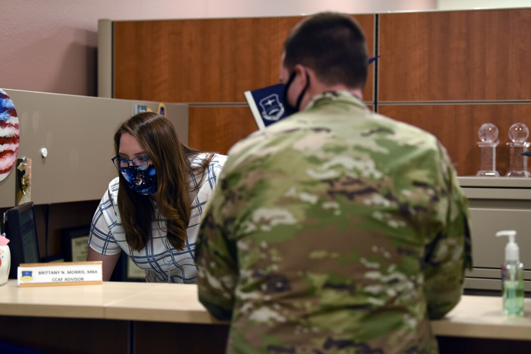 CCAF advisors speaks with Airman