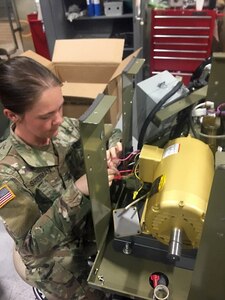 Sgt. Katherine Sherman works on a portable oxygen generator at the U.S. Army Medical Materiel Agency’s Medical Maintenance Operations Division at Hill Air Force Base in Utah during a recent deployment. Sherman and eight other Soldiers from the 6th Medical Logistics Management Center at Fort Detrick, Maryland, deployed to USAMMA’s three MMOD’s to supplement the workforce during the COVID-19 response as each depot saw spikes in work order requests.