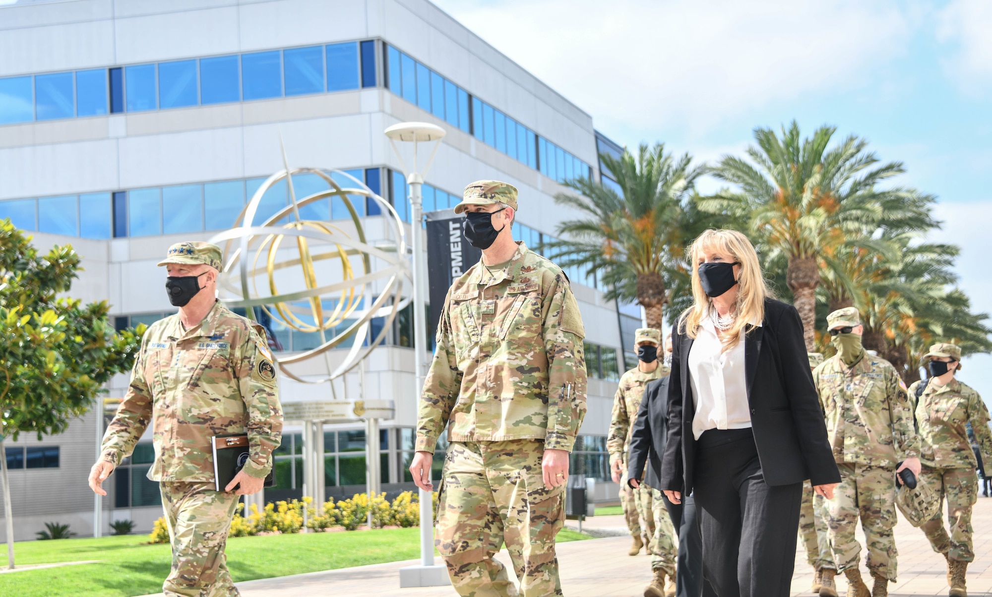 Gen. Jay Raymond (left), U.S. Space Force Chief of Space Operations and commander of U.S. Space Command, is welcomed by Brig. Gen. D. Jason Cothern (center), Space and Missile Systems Center vice commander, and Joy White (right), SMC executive director, during his first official SMC immersion since the USSF activation, July 15, 2020 at Los Angeles Air Force Base, Calif. Raymond met with SMC leaders to discuss the USSF organizational structure update and how the SMC mission impacts critical overarching space operations. (U.S. Space Force photo by Van Ha)