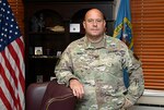 Army Col. Wayne Bondy stands in his DLA Disposition Services office.