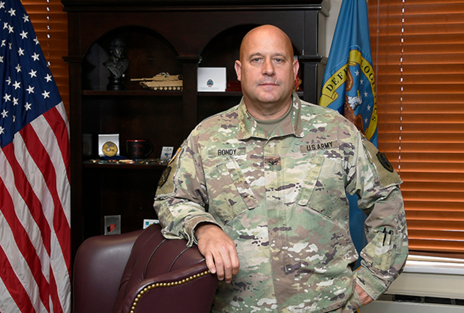 Army Col. Wayne Bondy stands in his DLA Disposition Services office.