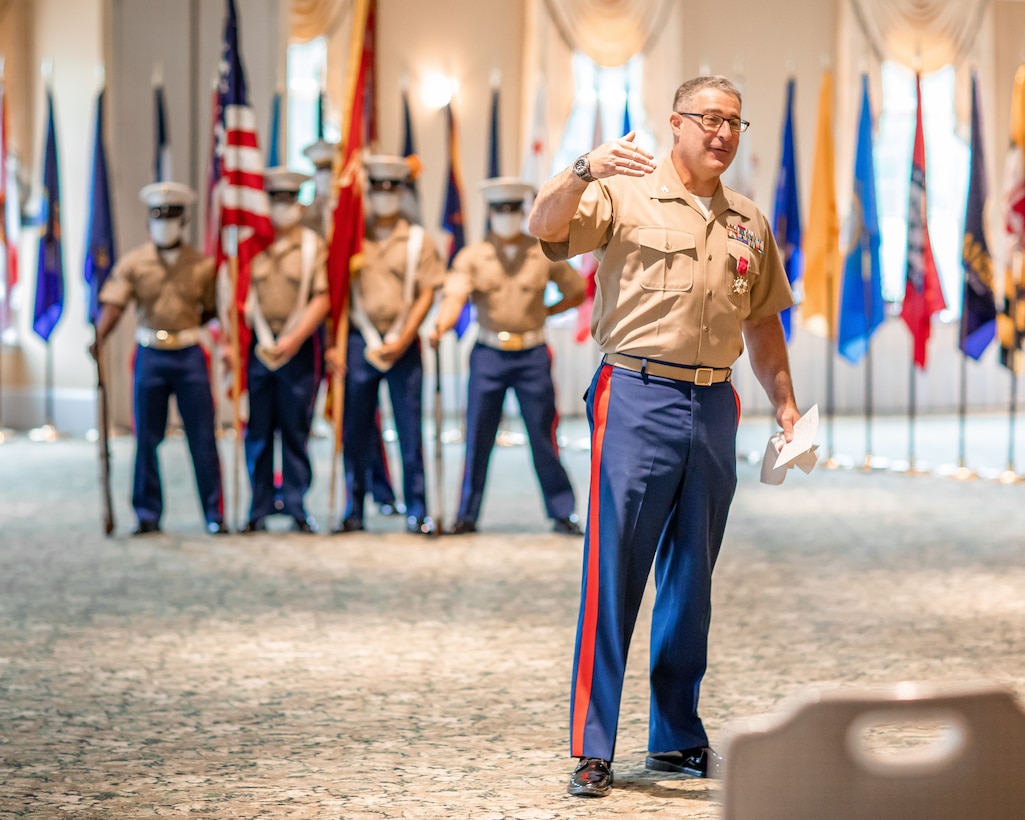 U.S. Marine Corps Col. Robert M. Clark, right, delivers his final remarks about his time as the commanding officer to the Marines, families and attendees of the 4th Marine Corps District Change of Command ceremony, held at the West Shore Country Club, Camp Hill, Pennsylvania, July 16, 2020. Col. Clark relinquished his command to Col. Heather J. Cotoia after three years commanding the 4th Marine Corps District. (U.S. Marine Corps Photo by Cpl. Cody J. Ohira)