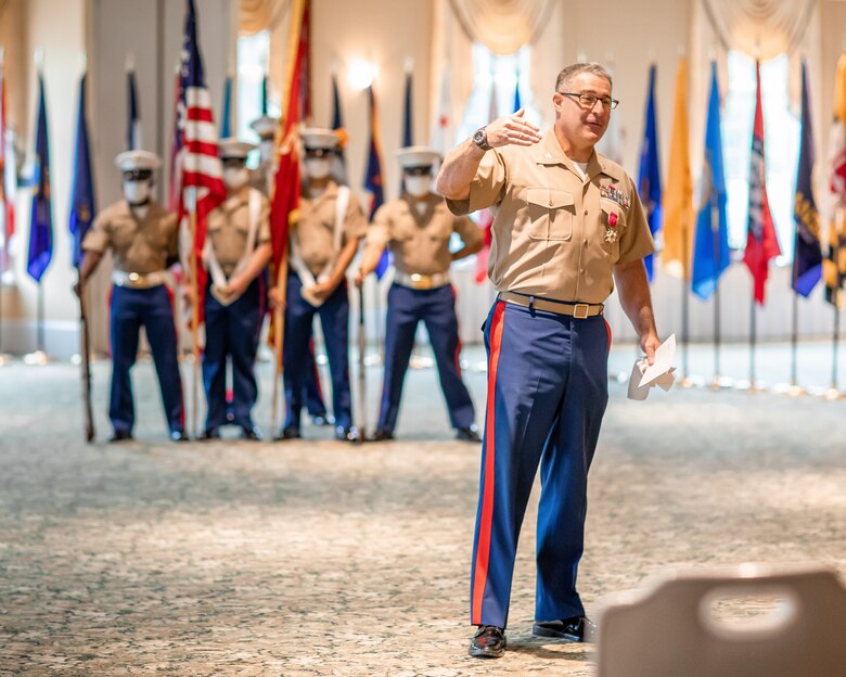 U.S. Marine Corps Col. Robert M. Clark, right, delivers his final remarks about his time as the commanding officer to the Marines, families and attendees of the 4th Marine Corps District Change of Command ceremony, held at the West Shore Country Club, Camp Hill, Pennsylvania, July 16, 2020. Col. Clark relinquished his command to Col. Heather J. Cotoia after three years commanding the 4th Marine Corps District. (U.S. Marine Corps Photo by Cpl. Cody J. Ohira)