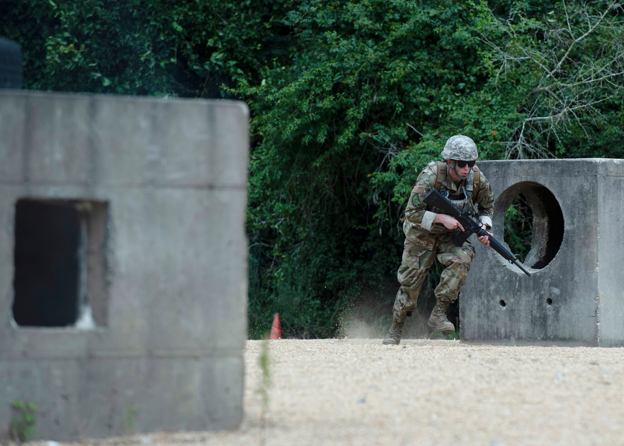 Staff Sgt Zachary Cartwight, 4th Aircraft Maintenance Squadron avionics technician, participates in shoot, move and communicate training during a combat skills training course at Seymour Johnson Air Force Base, North Carolina, July 13, 2020.