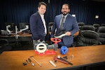 (Left to right) NSWC PHD ISEA of the Future Engineering Lead Jason Bickford and PHD Additive Manufacturing Lead Armen Kvryan with tool prototypes entered in PHD’s first-ever Office of Technology and In-Service Engineering Agent Additive Manufacturing Grand Challenge at the initial event in February.