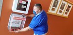 Chris Talamantez installs a Stop the Bleed kit at Brooke Army Medical Center at Joint Base San Antonio-Fort Sam Houston July 17.