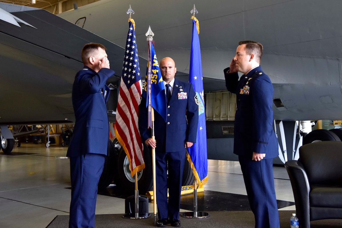 U.S. Air Force Lt. Col. Clayton Rabens renders a salute to Col. William Thoms, Jr., the 354th Medical Group commander, upon assuming command of the 354th Medical Operations Squadron during an assumption of command ceremony at Eielson Air Force Base, Alaska, July 17, 2020. Rabens is coming from the U.S. Air Force School of Aerospace Medicine, Wright-Patterson Air Force Base, Ohio, where he served as a resident. (U.S. Air Force photo by Senior Airman Beaux Hebert)