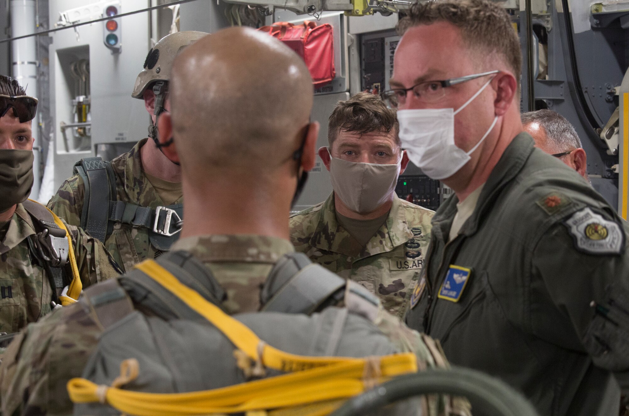 Aircrew talking to soldiers