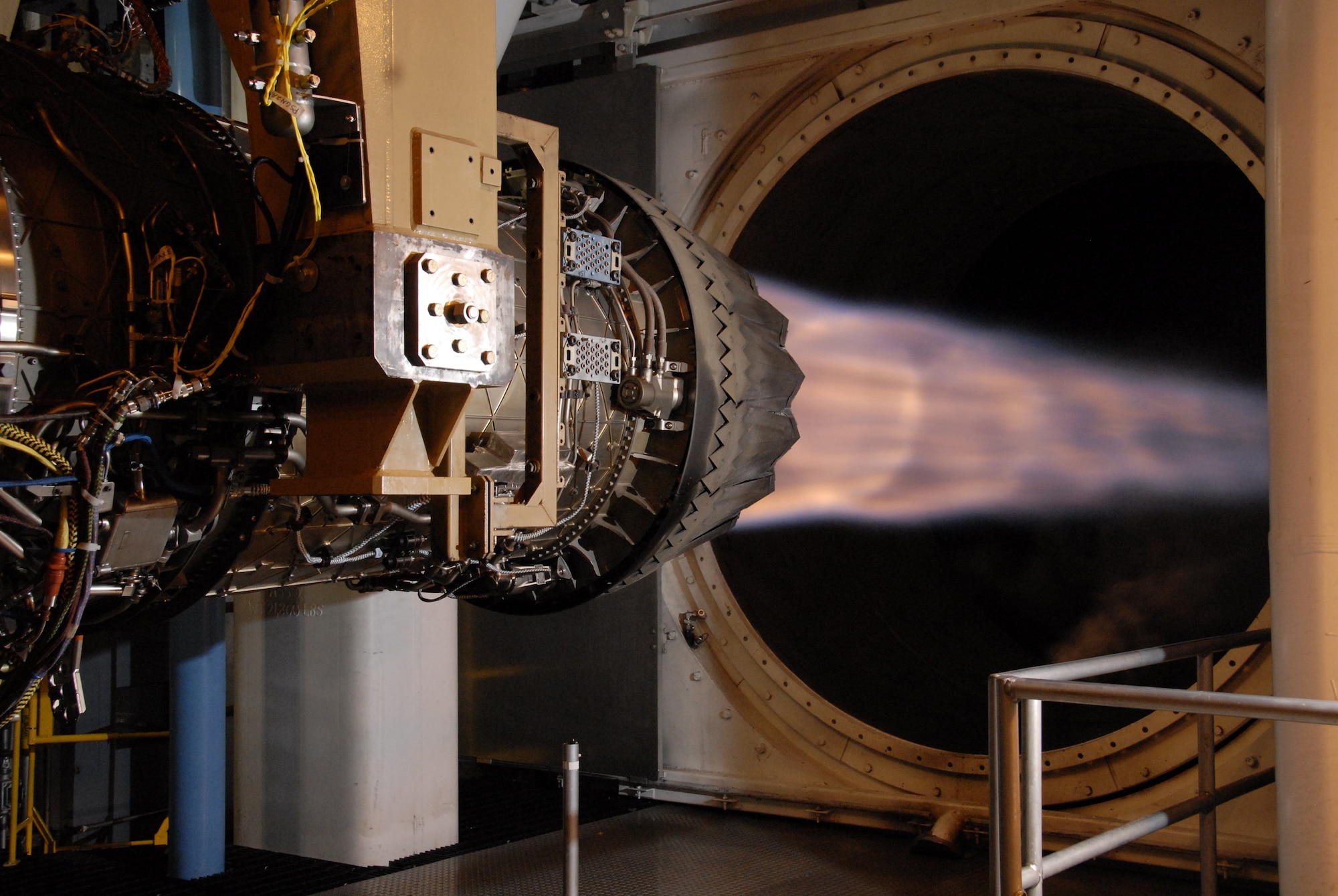 A Pratt & Whitney F135 engine for the F-35 Lighting II Joint Strike Fighter undergoes testing in the AEDC Sea Level 3 engine test cell.  Using a work station, known as the Remote Data Room, in the Propulsion Systems Evaluation Facility (PSEF) at Naval Air Station Patuxent River, Maryland, the PSEF test team is able to successfully monitor live engine testing, such as this, for the F135 occurring at Arnold Air Force Base. (U.S. Air Force photo)