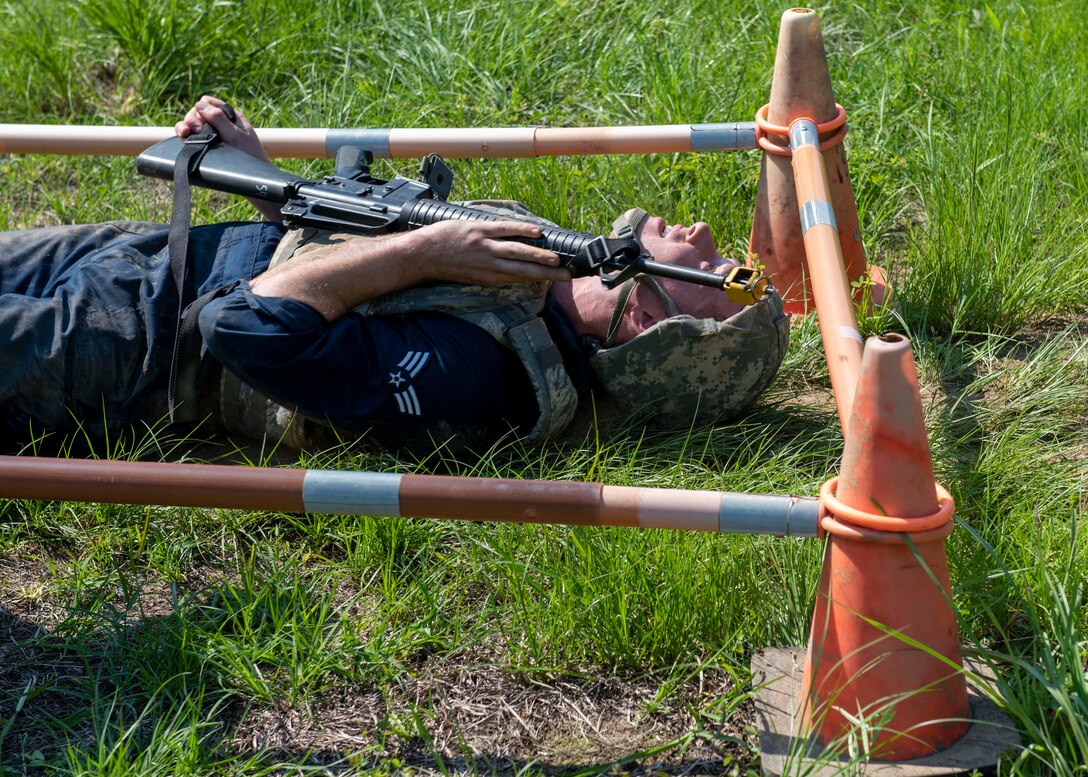 Staff Sgt Kyle Shaw, 4th Maintenance Group weapons lead crew chief, practices tactical movements during a combat skills training course at Seymour Johnson Air Force Base, North Carolina, July 13, 2020.