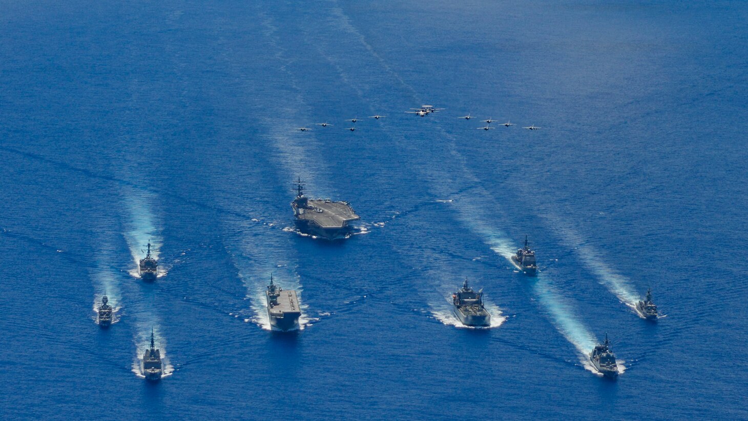 The Ronald Reagan Carrier Strike Group and units from the Japan Maritime Self-Defense Force (JSMDF) and Australian Defense Force (ADF) participate in trilateral exercises supporting shared goals of peace and stability, while enhancing regional security and the right of all nations to trade, communicate, and choose their destiny in a Free and Open Indo-Pacific. The Ronald Reagan Carrier Strike Group is the U.S. Navy's only forward-deployed strike group and one of America's most visible symbols of resolve.