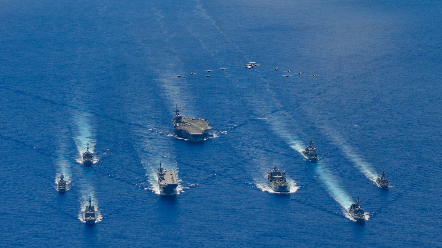 The Ronald Reagan Carrier Strike Group and units from the Japan Maritime Self-Defense Force (JSMDF) and Australian Defense Force (ADF) participate in trilateral exercises supporting shared goals of peace and stability, while enhancing regional security and the right of all nations to trade, communicate, and choose their destiny in a Free and Open Indo-Pacific. The Ronald Reagan Carrier Strike Group is the U.S. Navy's only forward-deployed strike group and one of America's most visible symbols of resolve.