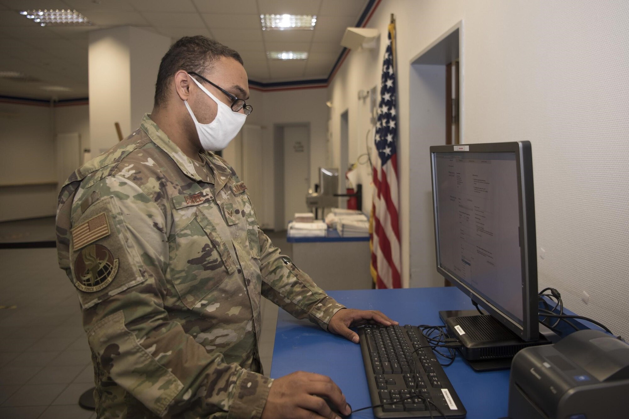 U.S. Air Force Senior Airman Patric Bushee, 786th Force Support Squadron military postal clerk, navigates to the United States Postal Service website on Ramstein Air Base, Germany, July 20, 2020. Two Click-N-Ship kiosks can be found at the Northside Post Office and are dedicated primarily to customers unfamiliar with the process or for those without printer access. (U.S. Air Force photo by Senior Airman Kristof J. Rixmann)