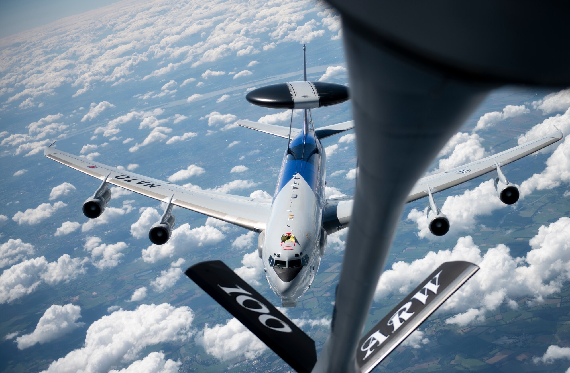 A NATO E-3 Sentry from Geilenkirchen NATO Air Base approaches a U.S. Air Force KC-135 Stratotanker assigned to the 100th Air Refueling Wing, RAF Mildenhall, England, to receive fuel over Germany, July 17, 2020.  The 100th ARW provides unrivaled air refueling support throughout the European and African areas of responsibility. (U.S. Air Force photo by Tech. Sgt. Emerson Nuñez)
