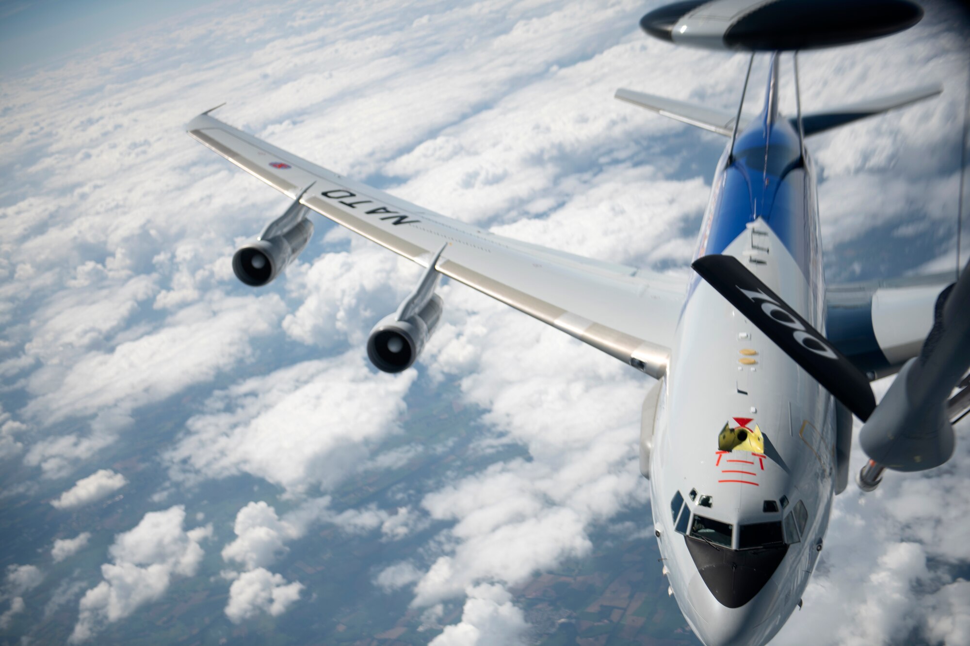 A NATO E-3 Sentry from Geilenkirchen NATO Air Base approaches a U.S. Air Force KC-135 Stratotanker assigned to the 100th Air Refueling Wing, RAF Mildenhall, England, to receive fuel over Germany, July 17, 2020. The 100th ARW provides unrivaled air refueling support throughout the European and African areas of responsibility. (U.S. Air Force photo by Tech. Sgt. Emerson Nuñez)