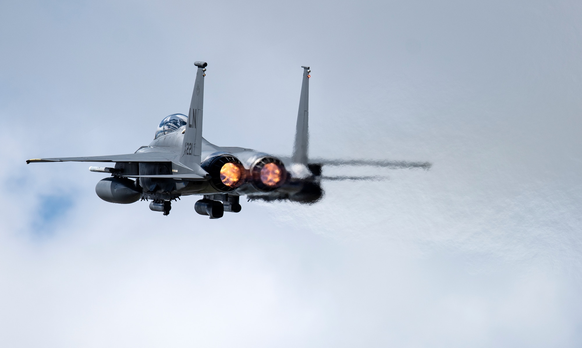 An F-15E Strike Eagle assigned to the 48th Fighter Wing takes off at Royal Air Force Lakenheath, England, July 20, 2020. The Liberty Wing conducts routine training in order to maintain combat readiness and safeguard U.S. national interests and the collective defense of allies and partners. (U.S. Air Force photo by Airman 1st Class Jessi Monte)