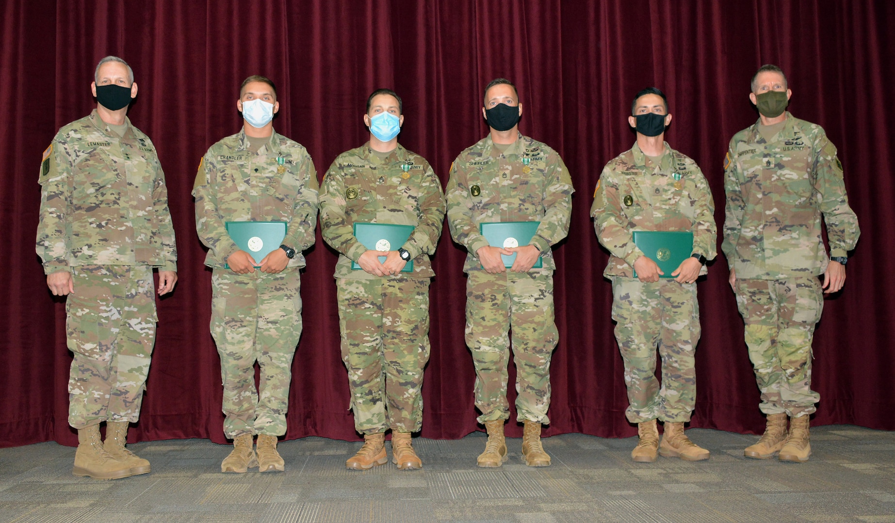 (From left) Maj. Gen. Dennis LeMaster, Spc. Tristan Chandler, Staff Sgt. Ryan Morgan, Sgt. 1st Class Jeremy Shepler, Drill Sgt. Travis Webster, and Command Sgt. Maj. Clark Charpentier at the Trinity Competition awards ceremony at Joint Base San Antonio-Fort Sam Houston July 20.