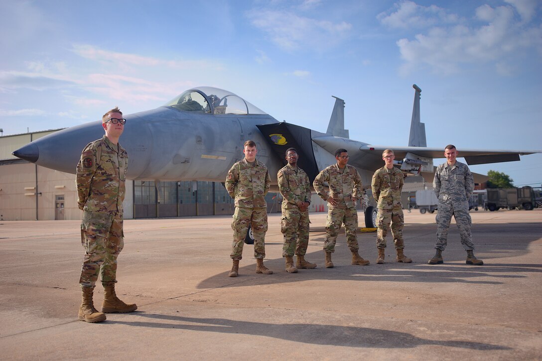 Airman 1st Class Colby Ballou, far left, 365th Training Squadron avionics apprentice course graduate, poses for a photo with his class at Sheppard Air Force Base, Texas, July 20, 2020. Throughout the 12 blocks of instruction Ballou did not miss a single questions in any of the block assessments. This achievement has earned him the ACE award. (U.S. Air Force photo by Steven Canham)