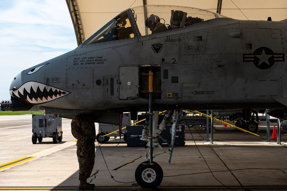 Photo of Airmen performing preflight operations.