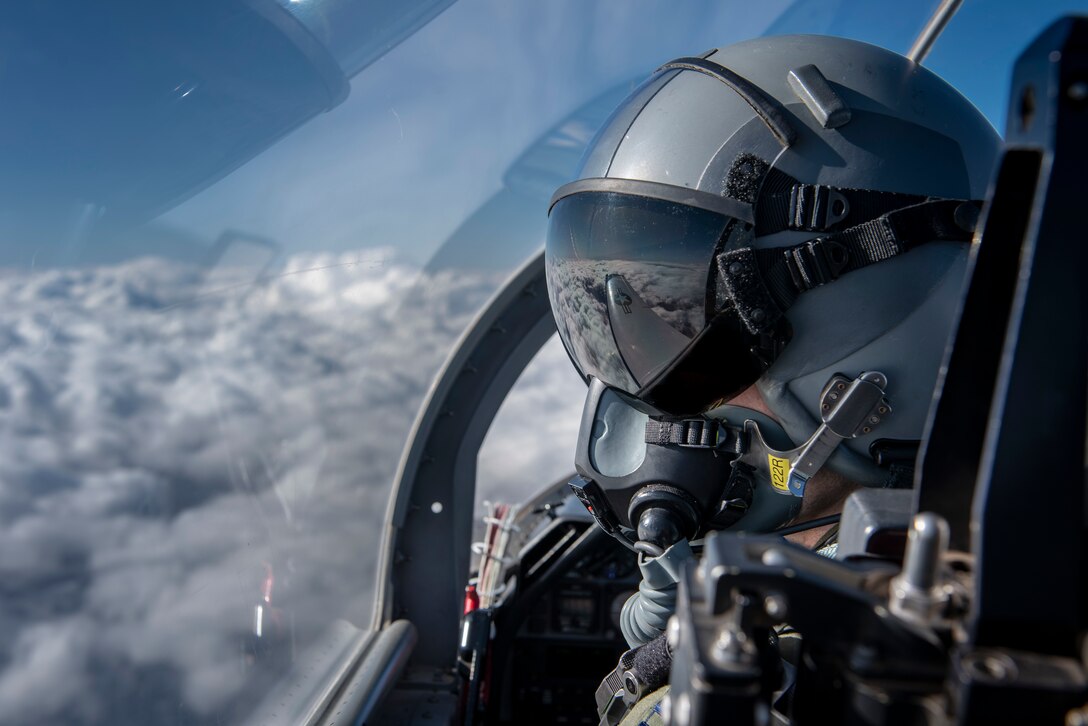 Capt. David Holien, an instructor pilot assigned to the 33rd Flying Training Squadron, scans the horizon while flying a T-6 Texan II Feb. 27, 2020, over Oklahoma. The T-6 is the primary trainer aircraft used to teach student pilots in basic flying skills common to the U.S. Air Force. (U.S. Air Force photo by Senior Airman Taylor Crul)