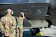 Airman 1st Class Lukas Turley, 354th Aircraft Maintenance Squadron crew chief, watches as Airman 1st Class Kelly McKamy, a 354th Aircraft Maintenance Squadron weapons load crew member, both assigned to Eielson Air Force Base, Alaska, closes the maintenance interface panel on an F-35 Lightning II at Joint Base Elmendorf-Richardson, Alaska, July 14, 2020.