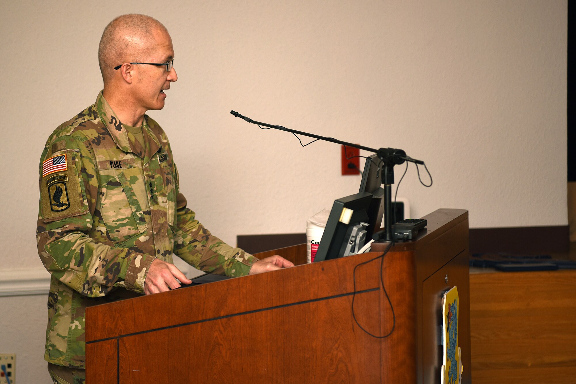 U.S. Army Lt. Gen. Ronald Place, Defense Health Agency director, delivers remarks during the 81st Medical Group change of command ceremony inside the Don Wiley Auditorium at Keesler Air Force Base, Mississippi, July 21, 2020. U.S. Air Force Col. Beatrice Dolihite, outgoing 81st MDG commander, relinquished command to Col. Christopher Estridge, incoming 81st MDG commander. (U.S. Air Force photo by Senior Airman Suzie Plotnikov)