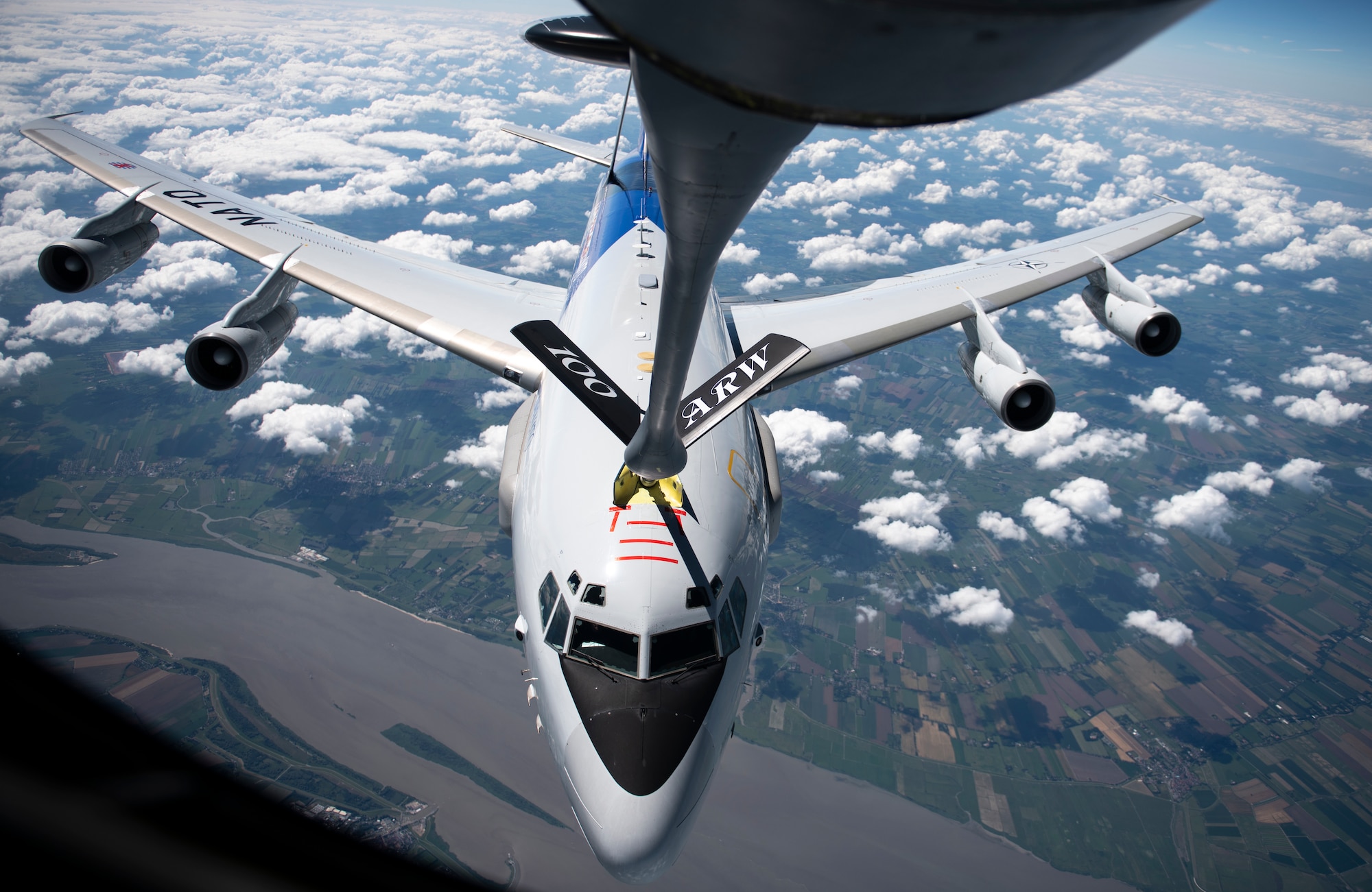 A NATO E-3 Sentry from Geilenkirchen NATO Air Base receives fuel from a U.S. Air Force KC-135 Stratotanker assigned to the 100th Air Refueling Wing, RAF Mildenhall, England, over Germany, July 17, 2020. The 100th ARW is the only permanent U.S. air refueling wing in the European theater, providing the critical air refueling "bridge" which allows the Expeditionary Air Force to deploy around the globe at a moment's notice. (U.S. Air Force photo by Tech. Sgt. Emerson Nuñez)