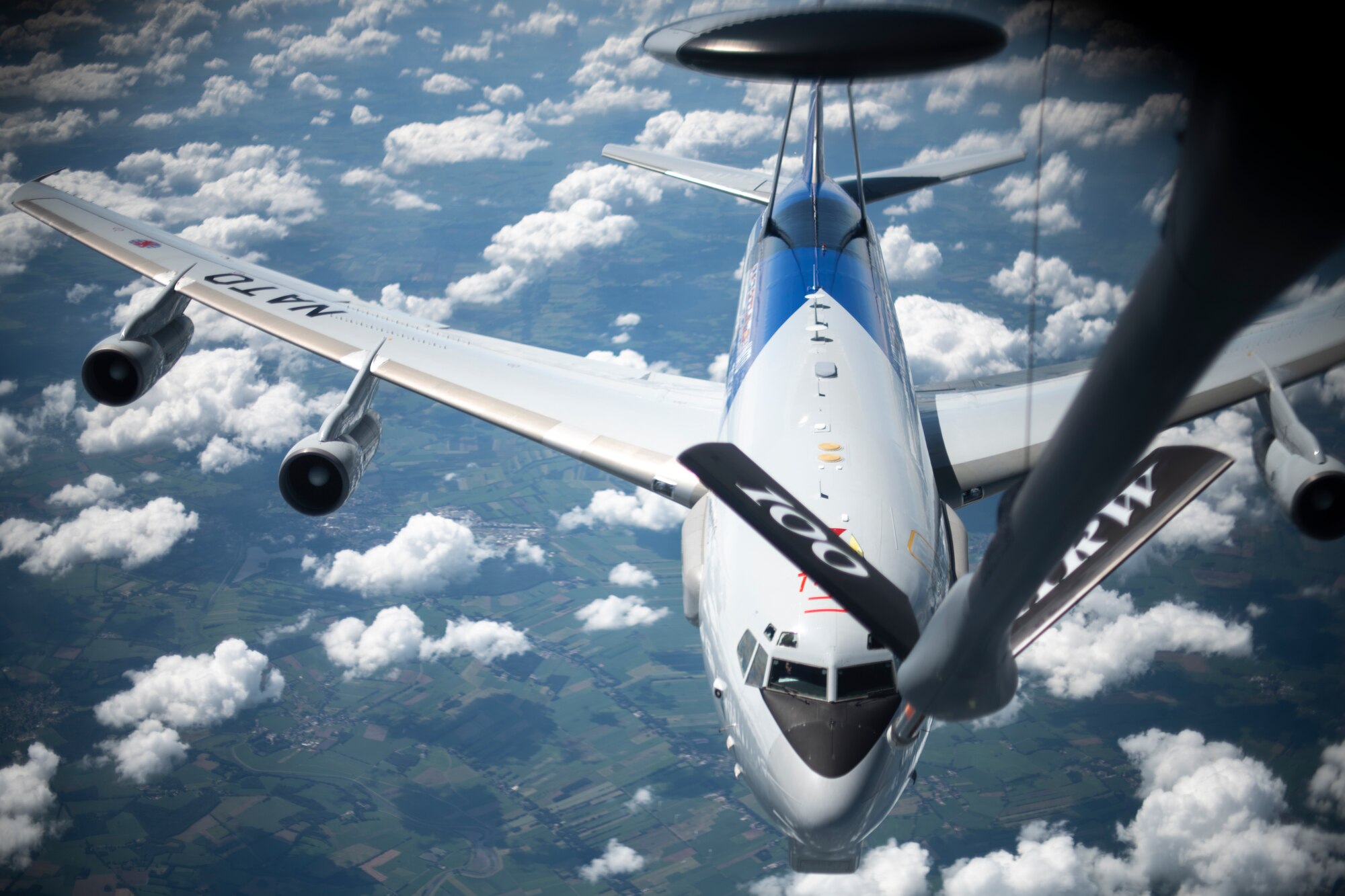 A NATO E-3 Sentry from Geilenkirchen NATO Air Base approaches a U.S. Air Force KC-135 Stratotanker assigned to the 100th Air Refueling Wing, RAF Mildenhall, England, to receive fuel over Germany, July 17, 2020. The 100th ARW provides unrivaled air refueling support throughout the European and African areas of responsibility. (U.S. Air Force photo by Tech. Sgt. Emerson Nuñez)